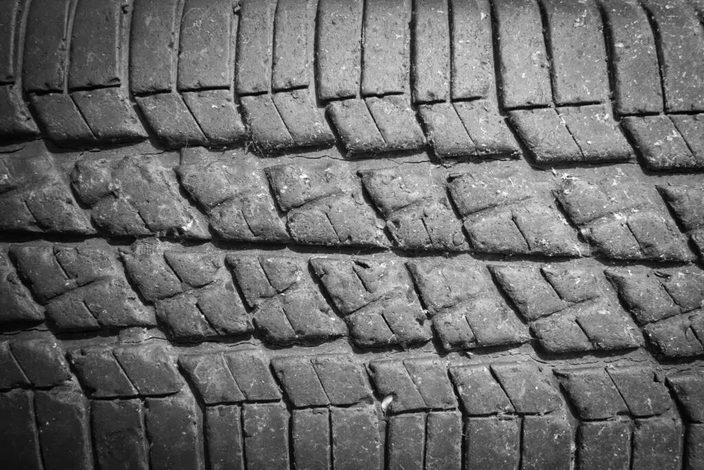 Hairline Cracks Between Tire Treads
